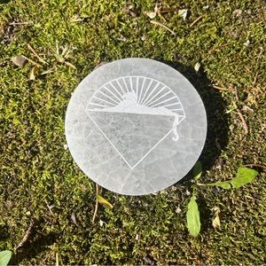 One (1) small gemstone Grateful Dead etched puck